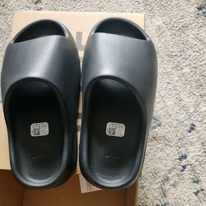Pair of brand new onyx Yeezy slides